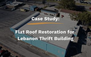 Aerial view of the Lebanon Thrift Building showcasing the restored flat roof system installed by Five Points Roofing for improved waterproofing and safety.