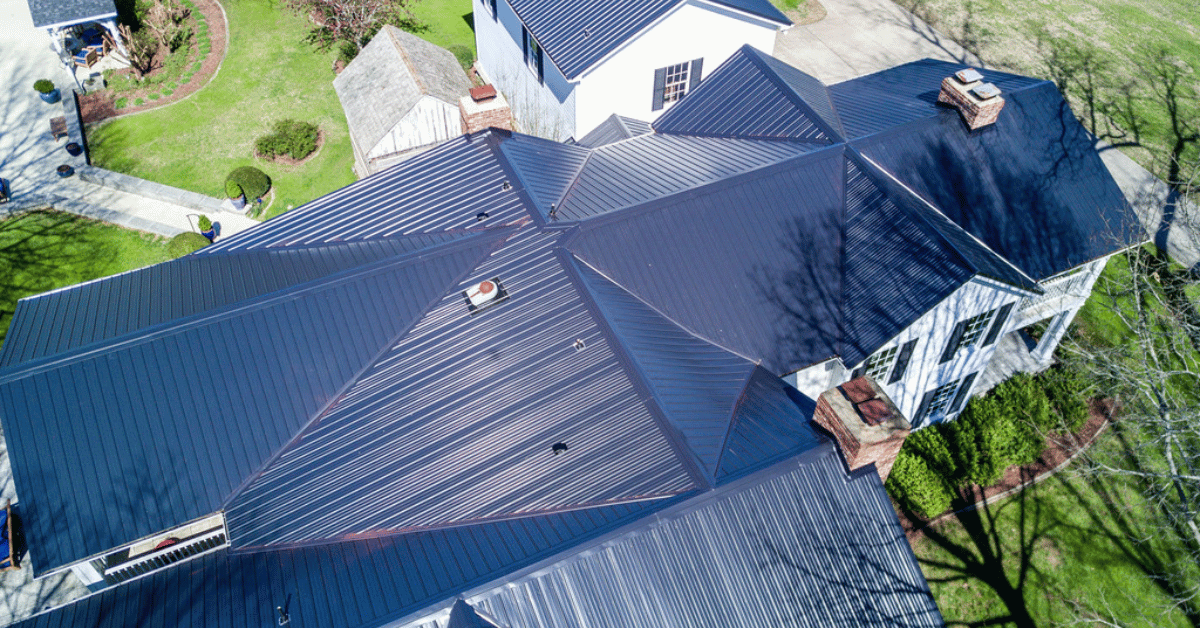 A completed metal roof with detailed architectural design.