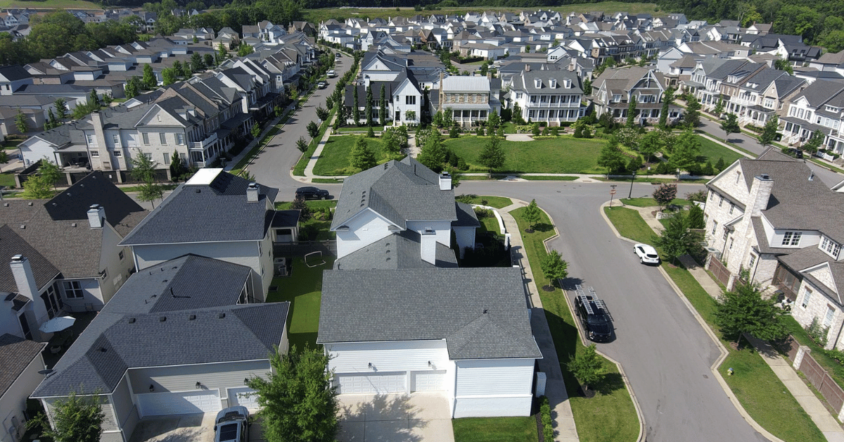 Roofing Questions: A scenic aerial view of a Franklin, Tennessee suburban neighborhood featuring newly installed roofs.