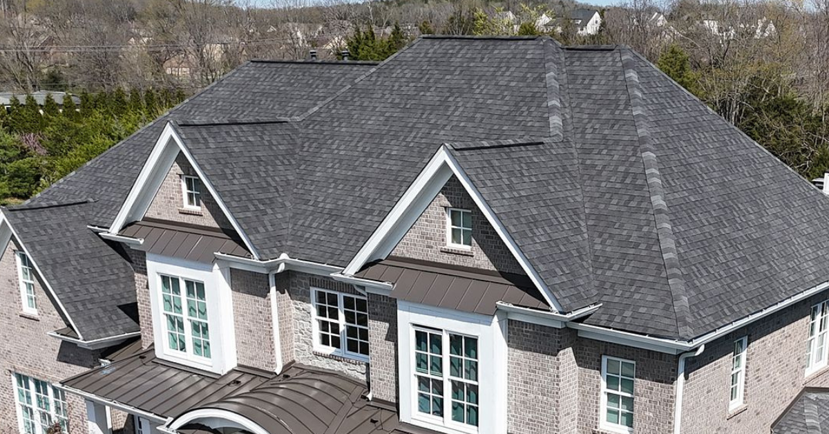 Aerial view of a newly installed architectural shingle roof on a home in Franklin, Tennessee by Five Points Roofing