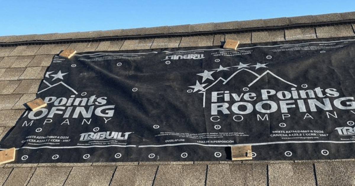 Five Points Roofing Branded Underlayment in Use Five Points Roofing Company-branded underlayment installed during roof replacement on Brentwood home.