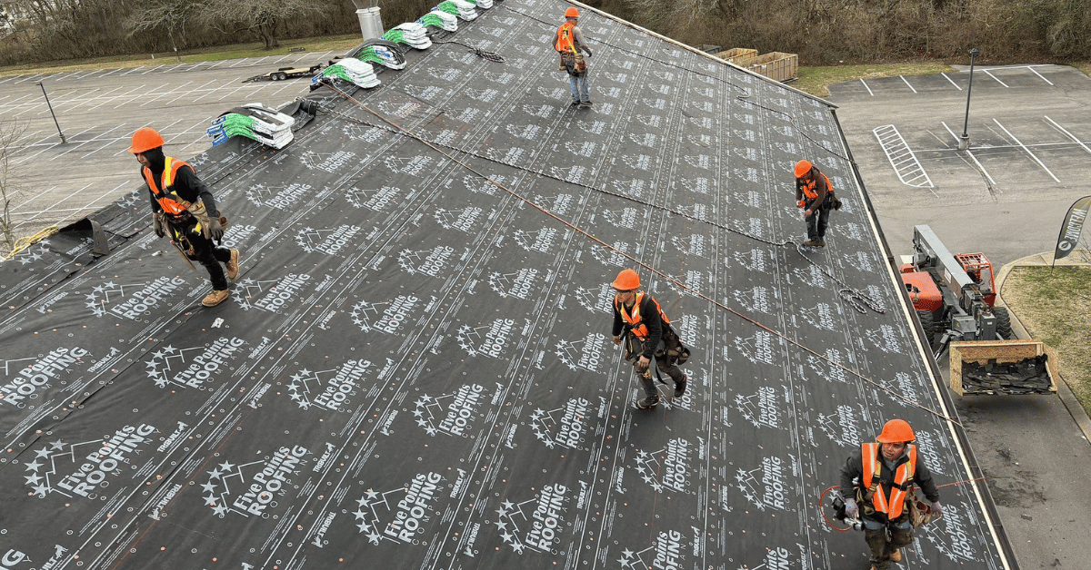 Underlayment Installation by Five Points Roofing Crew Roofing crew installing Tri-Built synthetic underlayment during roof replacement at Hillsboro Church.