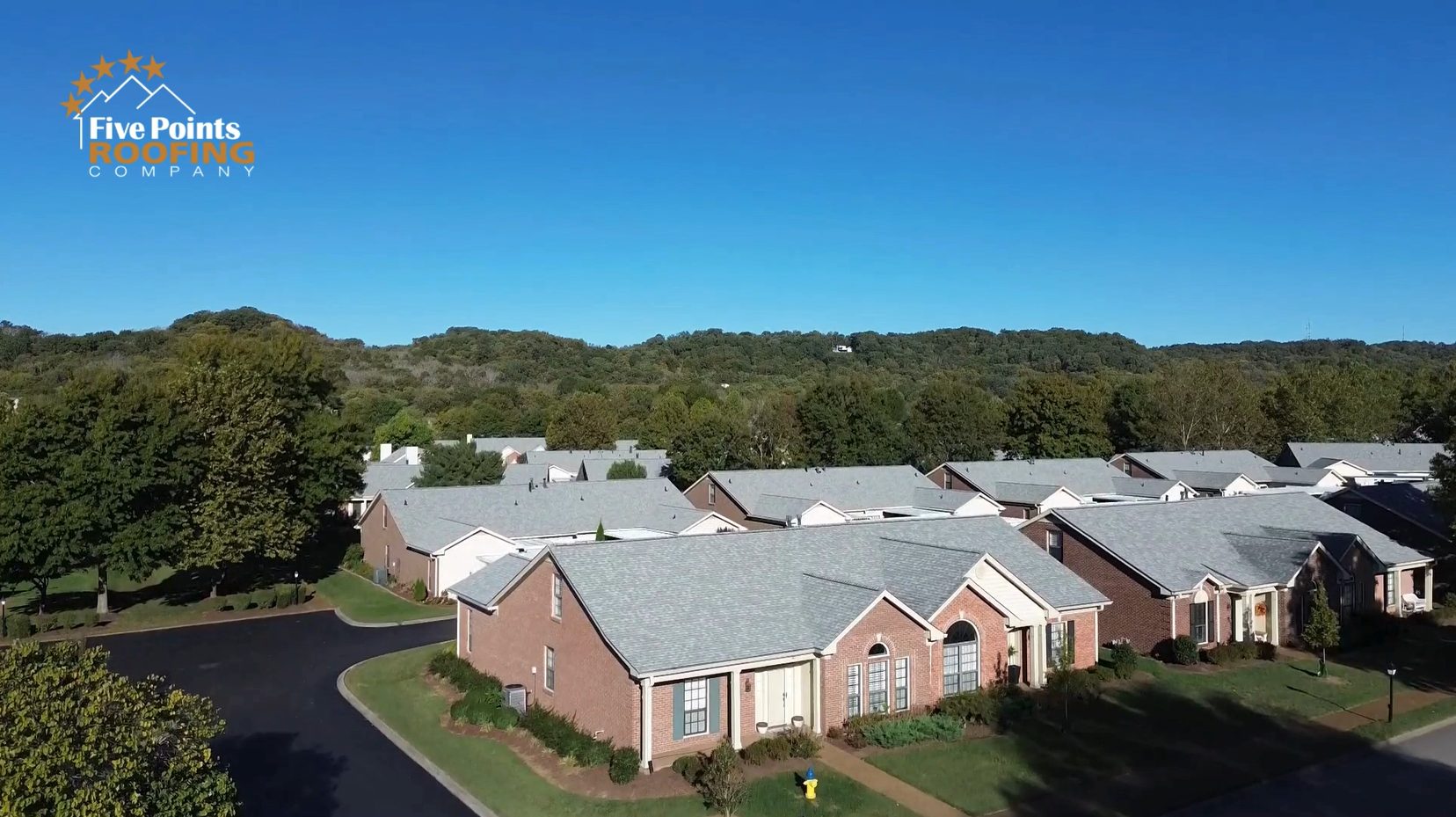 Premium Roofing Upgrade for HOA Community in Franklin, TN by Five Points Roofing Close-up of the front of homes in the Villages of Morningside with new shingles, showcasing clean lines and expert craftsmanship from Five Points Roofing.
